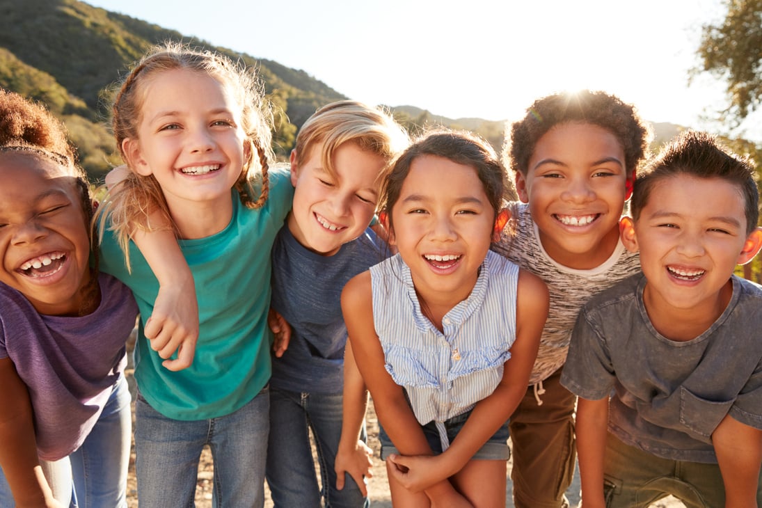 Portrait of Multi-Cultural Children Hanging Out with Friends in